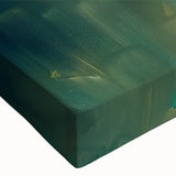 Close-up of an abstract figurative wall art design on stretched canvas, showcasing vibrant colors and intricate textures, perfect for modern decor.