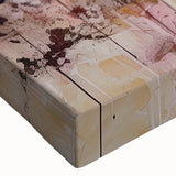 Close-up of a stretched canvas displaying an abstract floral design in vibrant colors, ideal for modern home decor and art enthusiasts.