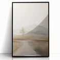 Framed wall art showcasing an abstract landscape design in soothing earth tones, featuring a sleek black frame that enhances contemporary decor. Perfect for modern living spaces.