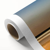 Abstract landscape wall art in vibrant blues and greens, rolled canvas design showcasing flowing shapes and textures, ideal for modern decor.