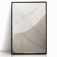 Framed acrylic wall art featuring an abstract minimalist design with a sleek black frame, showcasing geometric shapes and soft color gradients, perfect for modern decor.