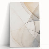 Abstract minimalist design wall art collection featuring a stretched canvas with soft beige and blue tones, leaning against a textured wall, perfect for modern home decor. The artwork showcases fluid shapes that evoke tranquility and creativity, ideal for enhancing living spaces.