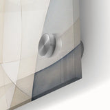 Close-up of an abstract minimalist wall art piece displayed in a sleek acrylic frame, featuring soft pastel colors and geometric shapes, perfect for modern home decor.