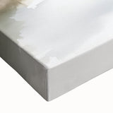 Close-up of a stretched canvas showcasing an abstract minimalist design, featuring soft pastel colors and geometric shapes, perfect for modern home decor.