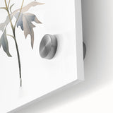 Close-up of an abstract minimalist wall art design featuring soft pastel colors and geometric shapes on acrylic glass, ideal for modern home decor.