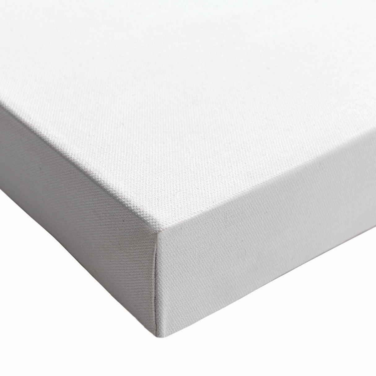 Close-up of a stretched canvas showcasing an abstract minimalist design, featuring soft pastel colors and geometric shapes, ideal for modern home decor.