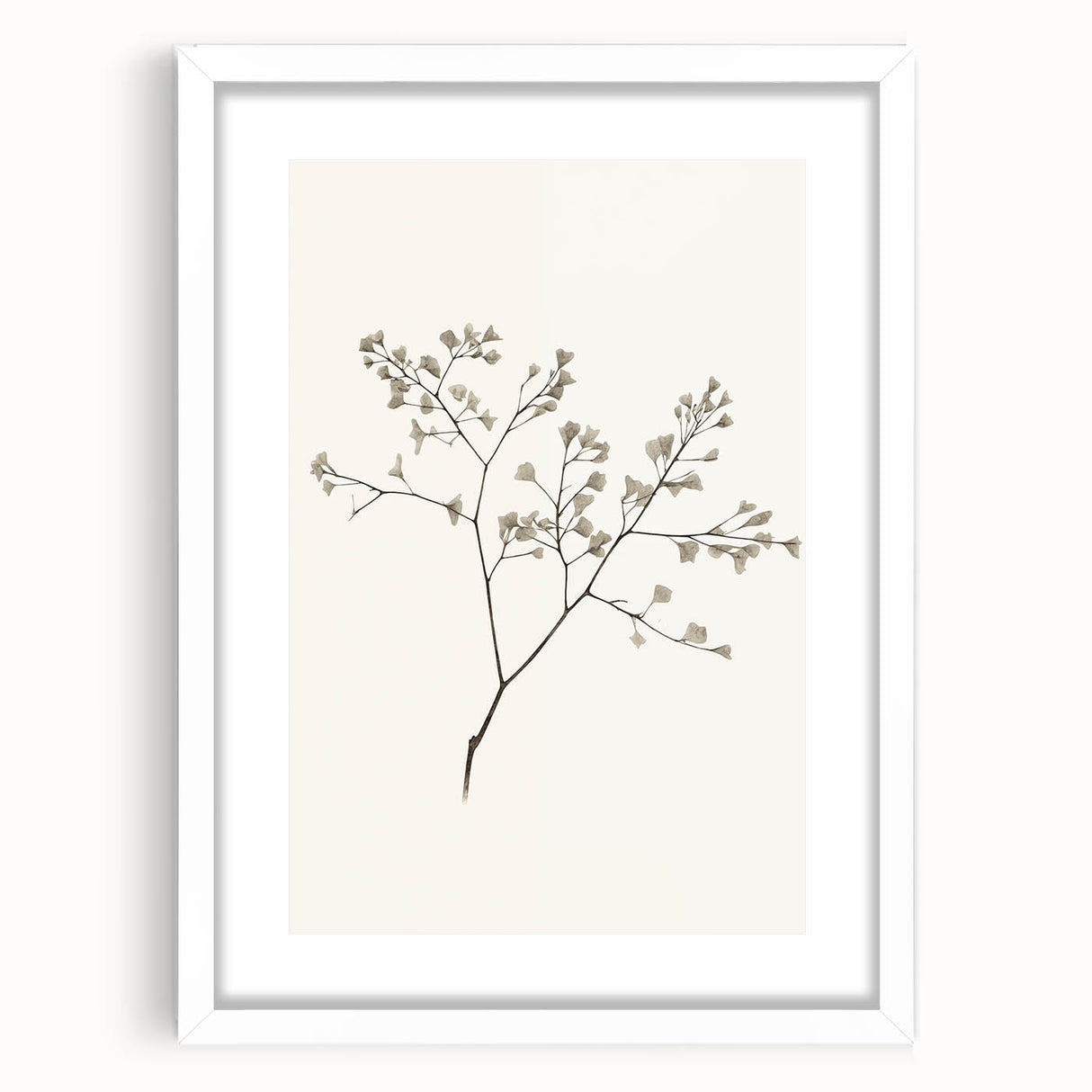 Minimalist wall art collection framed in white matting, showcasing an abstract design with soft earth tones, perfect for modern home decor.