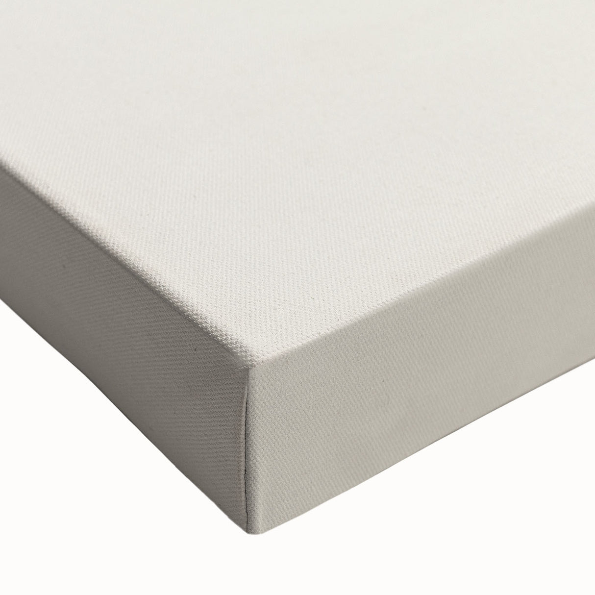 Close-up of an abstract minimalist design stretched canvas wall art piece, showcasing soft pastel colors and geometric shapes, perfect for modern home decor.