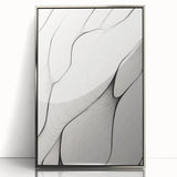 Framed abstract minimalist wall art featuring a sleek silver border, showcasing a modern design with soft color tones, ideal for contemporary home decor.