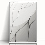 Framed abstract minimalist wall art design featuring a sleek white frame, showcasing geometric shapes and muted colors, ideal for modern decor.