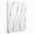 Abstract minimalist wall art design showcasing soft earth tones and geometric shapes on a stretched canvas, viewed from the side, perfect for modern decor.
