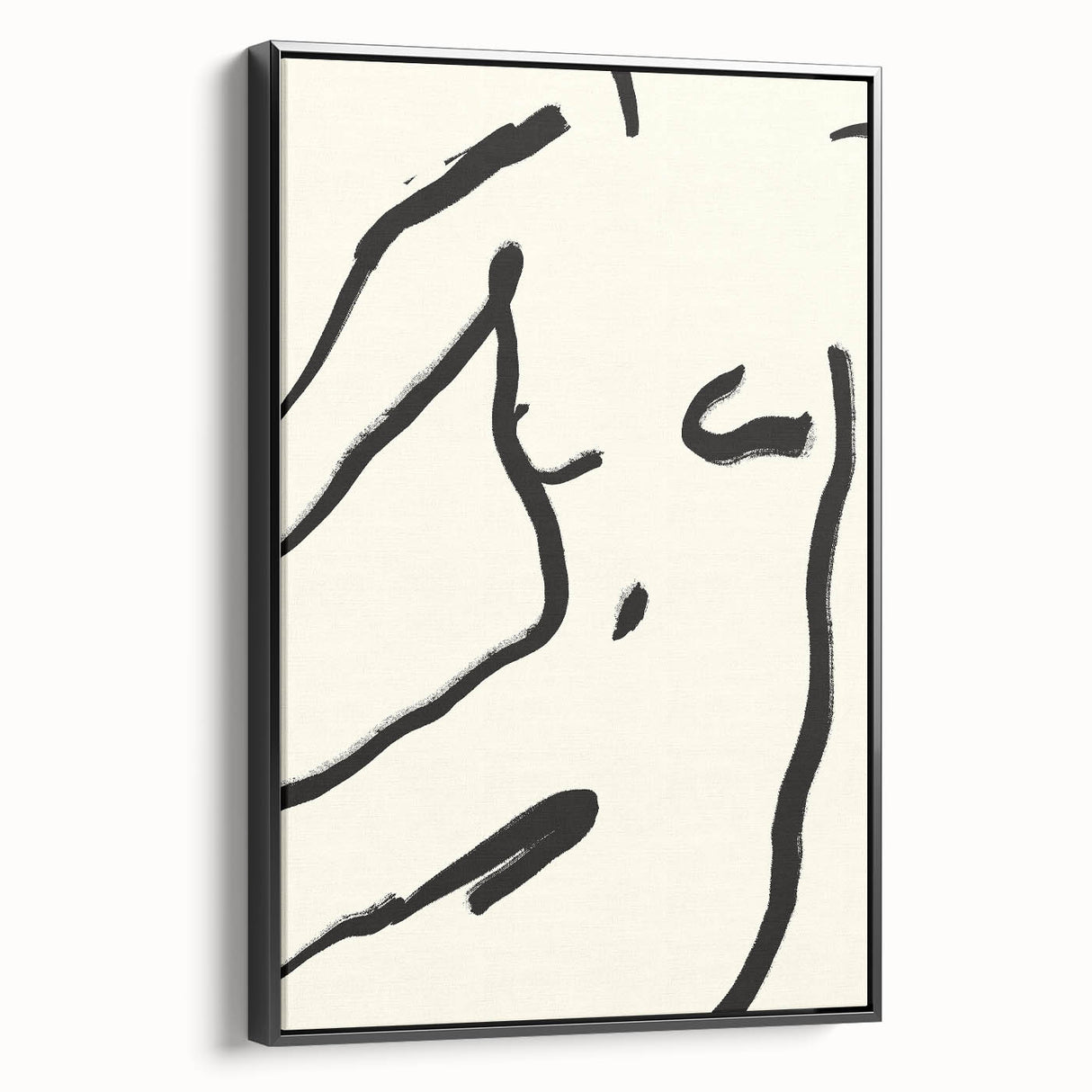 Framed canvas wall art showcasing an abstract minimalist design in black, featuring a sleek side view that emphasizes its modern aesthetic and elegant finish.