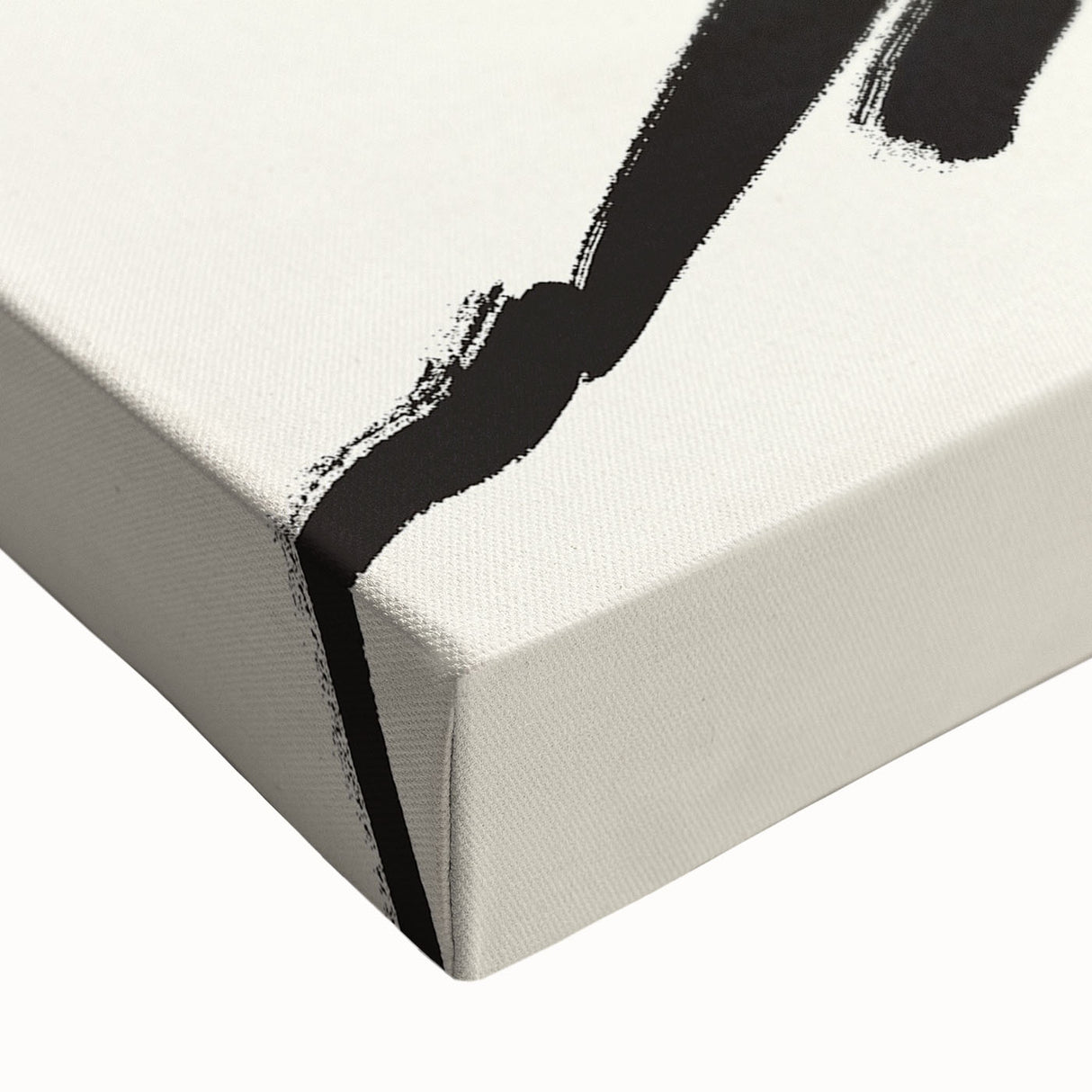 Close-up of a stretched canvas showcasing an abstract minimalist design featuring soft earth tones and subtle textures, ideal for modern home decor.