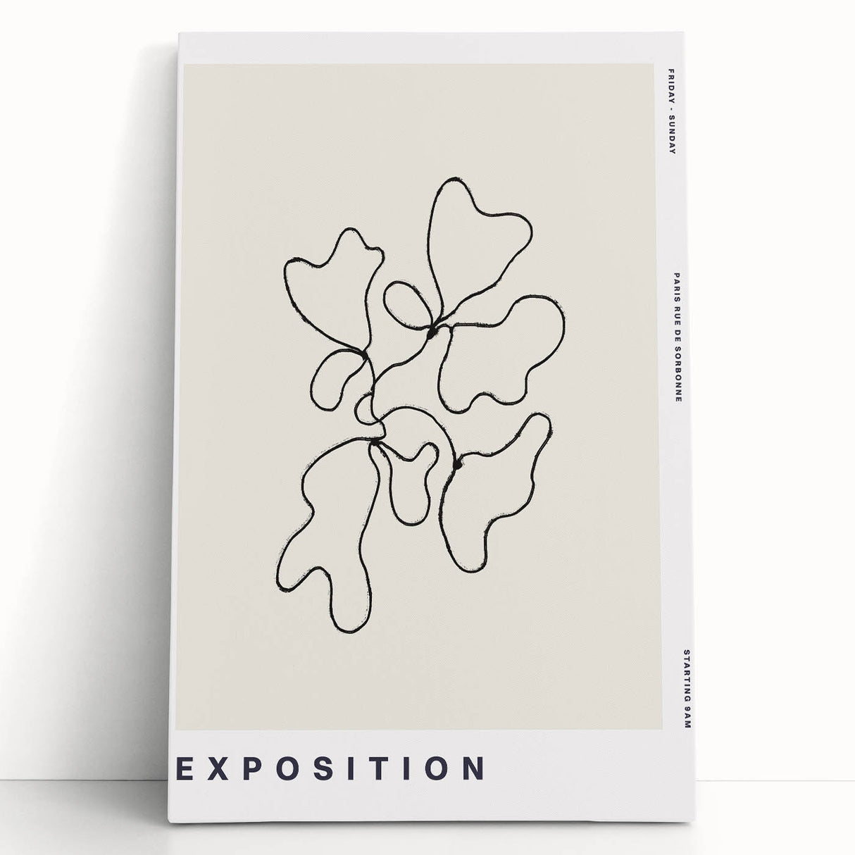 Abstract minimalist design wall art collection featuring a stretched canvas with soft beige and gray tones, leaning against a neutral wall, ideal for modern decor.