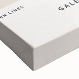 Close-up of a stretched canvas showcasing an abstract minimalist design with vibrant colors, perfect for modern home decor or office spaces, highlighting artistic elegance.