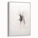 Framed canvas artwork showcasing an abstract minimalist design in neutral tones, displayed in a white frame, perfect for modern home decor.