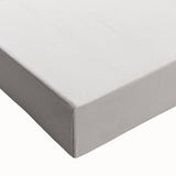 Close-up of a stretched canvas showcasing an abstract minimalist design with soft earth tones and geometric shapes, perfect for modern home decor.