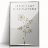 Framed acrylic wall art featuring an abstract minimalist design in silver tones, showcasing a sleek, modern aesthetic ideal for contemporary decor.