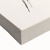 Close-up of an abstract minimalist design stretched canvas wall art featuring soft pastel colors and geometric patterns, ideal for modern home decor.