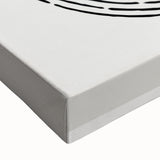 Close-up of an abstract minimalist design wall art piece featuring soft pastel colors and geometric shapes, printed on stretched canvas for modern decor.