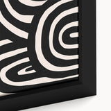 Close-up of a framed canvas featuring an abstract minimalist design in muted colors, showcasing geometric shapes and smooth lines, ideal for modern home decor.