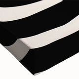 Close-up of a stretched canvas showcasing an abstract minimalist design featuring soft earth tones and geometric shapes, ideal for modern home decor. This artwork enhances contemporary interiors with its subtle elegance and artistic flair.