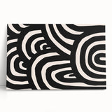 Abstract minimalist wall art design featuring soft earth tones and geometric shapes on a stretched canvas, leaning against a neutral wall for a modern aesthetic.