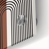 Close-up of an abstract minimalist wall art piece showcasing vibrant blue and orange colors, framed in sleek acrylic glass for a modern aesthetic. Ideal for contemporary home decor.