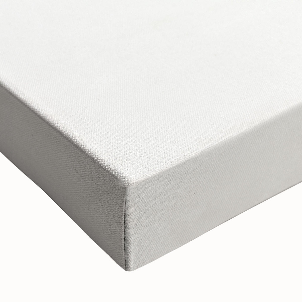 Close-up of an abstract minimalist stretched canvas wall art piece, showcasing soft neutral tones and fluid shapes, perfect for modern decor.