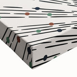 Close-up of an abstract minimalist wall art piece showcasing a design with soft colors and geometric shapes, printed on stretched canvas for modern decor.