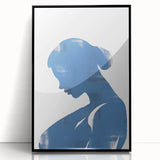 Framed abstract minimalist wall art featuring a striking black design on a white background, ideal for modern home decor and stylish interiors.