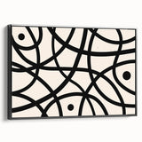 Framed abstract minimalist wall art design in a sleek black frame, showcasing geometric shapes and muted colors, ideal for modern home decor and artistic styling.