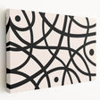 Stretched canvas showcasing an abstract minimalist design with soft pastel colors, perfect for modern decor, viewed from the side to highlight its depth and texture.