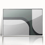 Framed acrylic wall art showcasing an abstract minimalist design with a white frame, highlighting geometric shapes and subtle colors, perfect for modern decor.