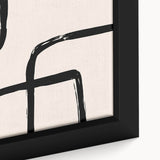 Close-up of a framed abstract minimalist wall art piece showcasing a blend of soft pastel colors and geometric shapes, adding a modern touch to any interior decor.