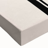 Close-up of a stretched canvas featuring an abstract minimalist wall art design with soft earth tones and geometric shapes, ideal for modern home decor.