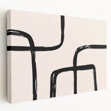 Stretched canvas showcasing an abstract minimalist design with muted colors, framed in a sleek modern style, ideal for contemporary home decor enhancement.