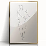 Framed minimalist wall art with abstract gold design and acrylic finish, showcasing elegant geometric patterns against a neutral backdrop.