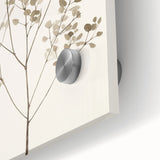 Close-up of an abstract minimalist wall art piece showcasing vibrant colors and geometric shapes, displayed in a sleek acrylic glass frame.