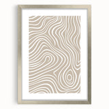 Abstract minimalist wall art collection showcasing a silver-framed piece with a mat, featuring soft colors and geometric shapes for modern decor.