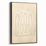 Framed minimalist abstract wall art in black and white, showcasing geometric shapes and lines, viewed from the side against a neutral backdrop.