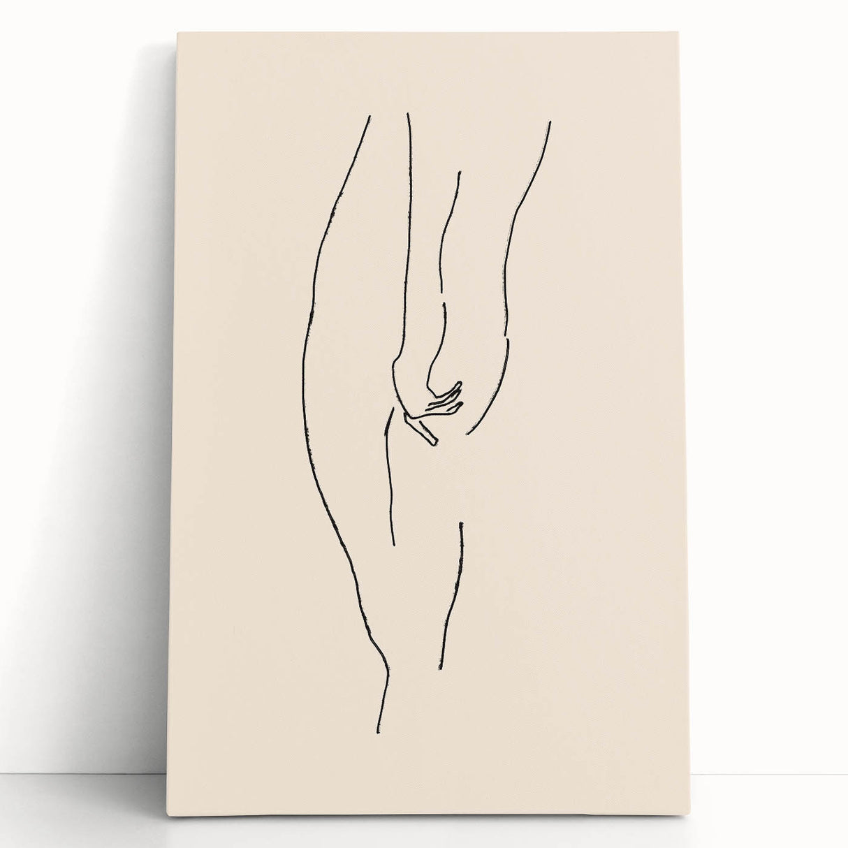 Abstract minimalist wall art featuring soft pastel colors and geometric shapes, displayed on a stretched canvas, leaning against a light wall.