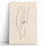 Abstract minimalist wall art featuring soft pastel colors and geometric shapes, displayed on a stretched canvas, leaning against a light wall.