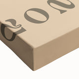 Close-up of a stretched canvas showcasing an abstract minimalist design with soft pastel colors and fluid shapes, perfect for modern decor.