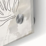 Close-up of a modern abstract minimalist wall art piece featuring vibrant colors and geometric shapes, displayed on sleek acrylic glass for contemporary decor.