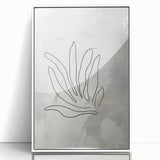 Framed minimalist wall art featuring an abstract design in soft hues, presented in a sleek white frame against a bright background.