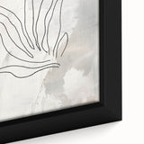 Close-up of a framed minimalist wall art canvas showcasing an abstract design with soft pastel colors and sleek lines, perfect for modern decor.