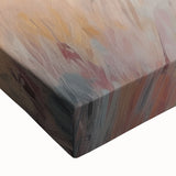 Close-up of a stretched canvas featuring an abstract minimalist design with vibrant colors and intricate textures, ideal for modern home decor.