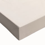 Close-up of a stretched canvas featuring an abstract minimalist design with soft pastel colors and geometric shapes, ideal for modern home decor.