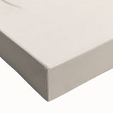 Close-up of abstract minimalist wall art design on stretched canvas, showcasing soft earth tones and fluid shapes, ideal for modern decor.